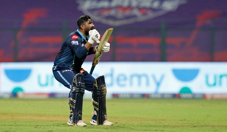 Rahul Tewatia of Gujarat Titans celebrates the team's win in the Indian Premier League 2022 cricket match between Gujarat Titans and the Sunrisers Hyderabad, at Wankhede stadium in Mumbai, Wednesday, April 27, 2022 | AP