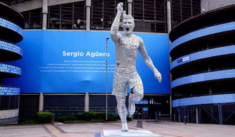 A statue of Manchester City legend Argentinian Sergio Aguero outside the Etihad Stadium, to commemorate the tenth anniversary of the Club's first Premier League title and the iconic '93:20' moment in Manchester | AP