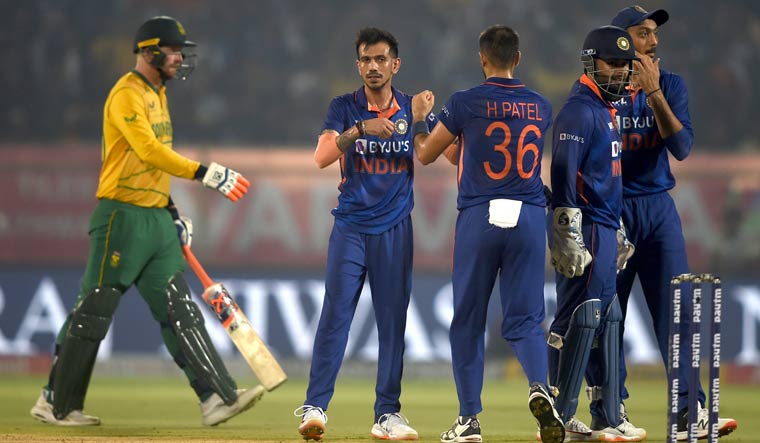 Yuzvendra Chahal celebrates with Harshal Patel and other teammates after the wicket of South Africa's Rassie van der Dussen, in the third T20I, in Visakhapatnam | PTI
