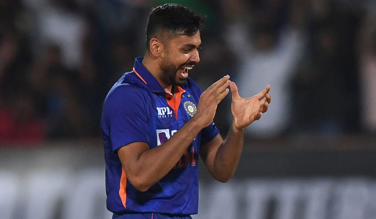 Avesh Khan celebrates after the taking the wicket of South Africa's Keshav Maharaj in the fourth T20 international match, in Rajkot | AFP
