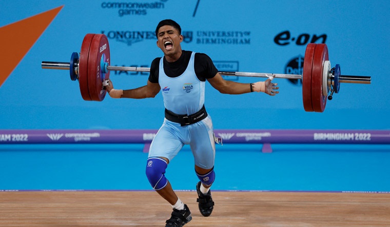 Sanket Sargar in action in the weightlifting men's 55kg category at the Commonwealth Games in Birmingham | Reuters