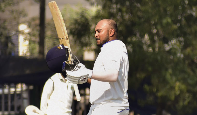 Mumbai's batter Prithvi Shaw celebrates after scoring a century in a Ranji Trophy match against Assam | PTI