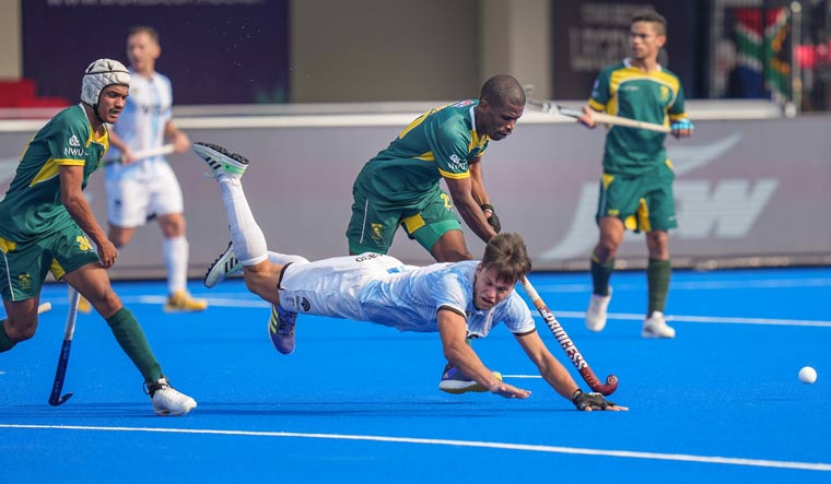Argentina's Nicols Keenan and South Africa's Dayaan Cassiem during the FIH Odisha Hockey Men's World Cup 2023 match | PTI
