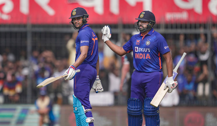 Shubman Gill being congratulated by team captain Rohit Sharma after his half century | PTI