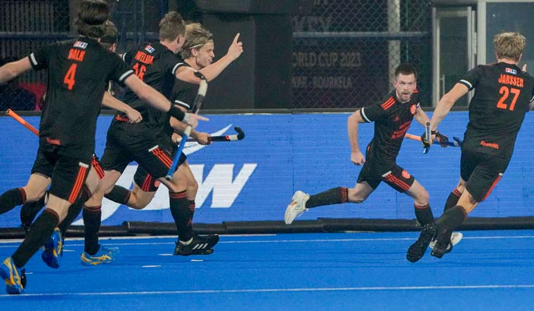 Netherlands' Brinkman Thierry (2R) celebrates after scoring his team's third goal | PTI