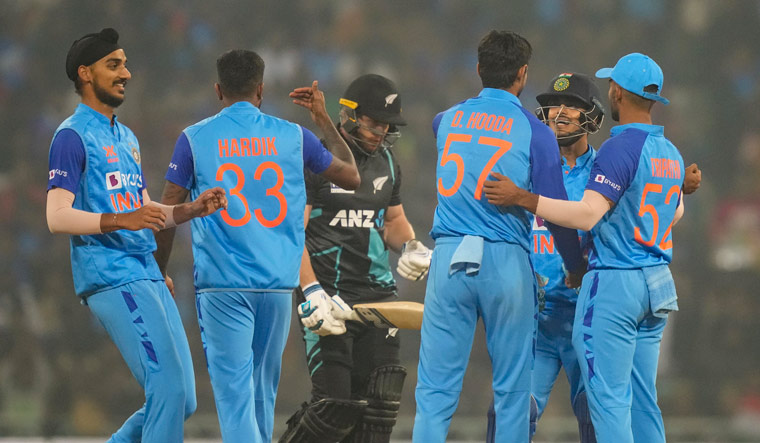 Indian bowler Deepak Hooda with teammates celebrates the wicket of Glenn Phillips  | PTI