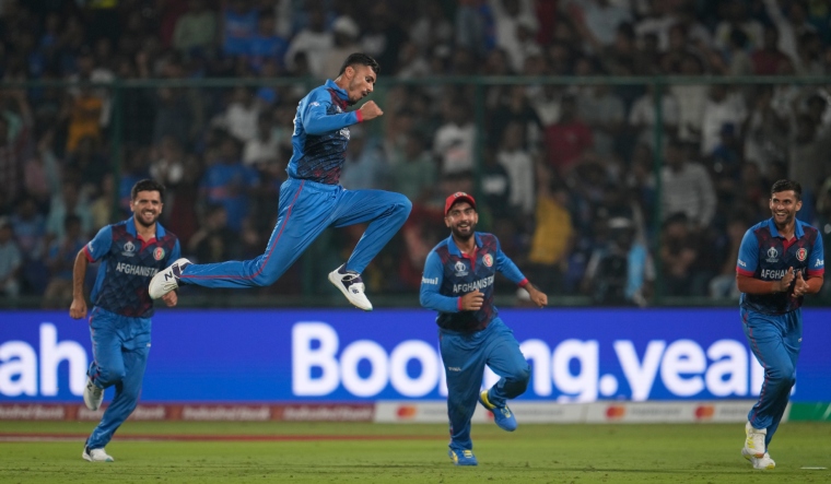 Afghanistan's Mujeeb ur Rahman celebrates the wicket of England's Chris Woakes | AP