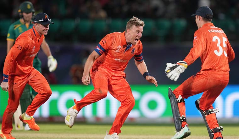 Netherlands' Logan van Beek celebrates with teammates after taking the wicket of South Africa's David Miller | PTI