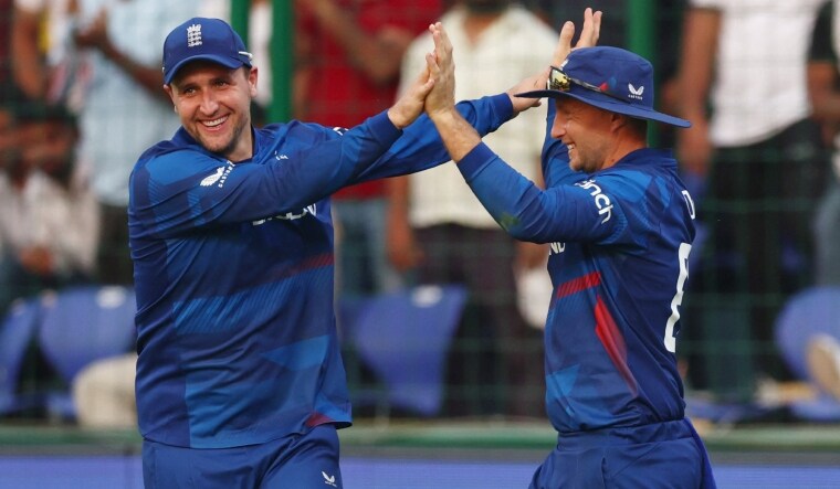 England's Joe Root celebrates a wicket with Liam Livingstone | Reuters