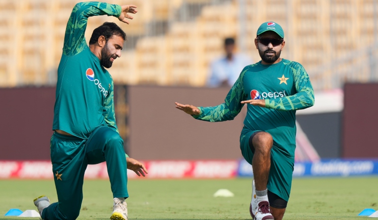 pakistans-babar-azam-r-and-iftikhar-ahmed-attend-a-practice-session-ap