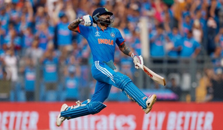 Virat Kohli celebrates after reaching his 50th century | Reuters