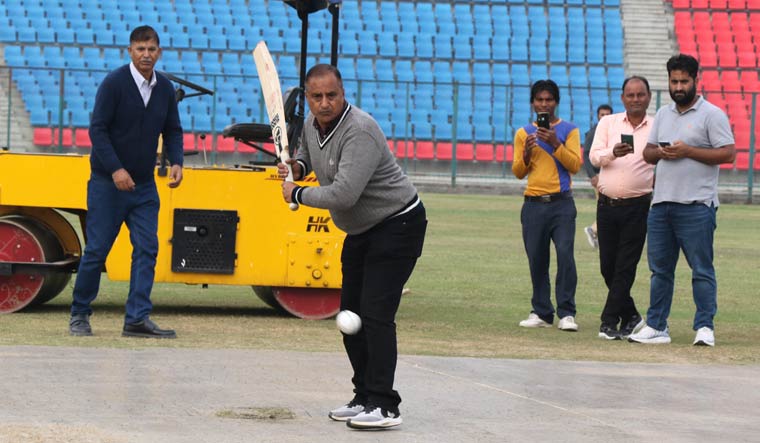 Security officials inspects the pitch at Maulana Azad Stadium ahead of Legends Cricket  League 2023, in Jammu | PTI