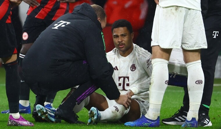 Bayern Munich's Serge Gnabry receives medical attention | Reuters