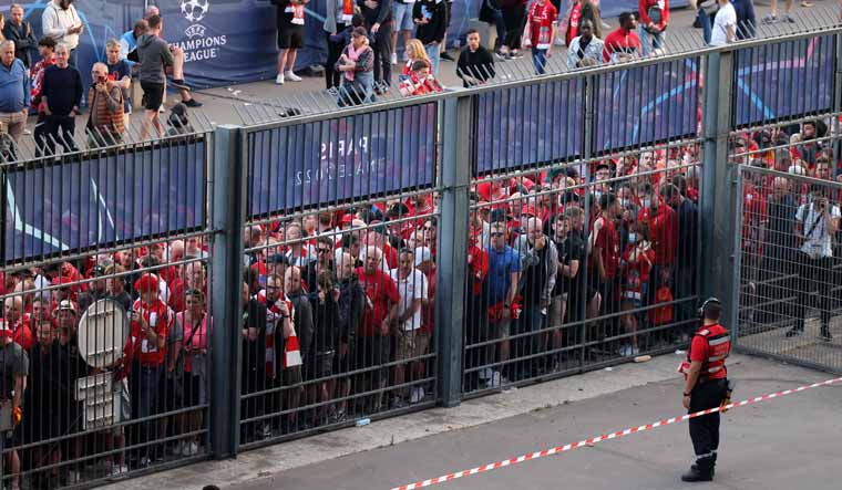(File) Liverpool fans stand outside unable to get in in time leading to the match being delayed prior to the UEFA Champions League final against Real Madrid | AFP