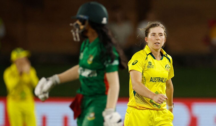 Australia's Georgia Wareham (R) celebrates after dismissing Bangladesh's Shorna Akter (L) during the Group A T20 women's World Cup match in Gqeberha | AFP