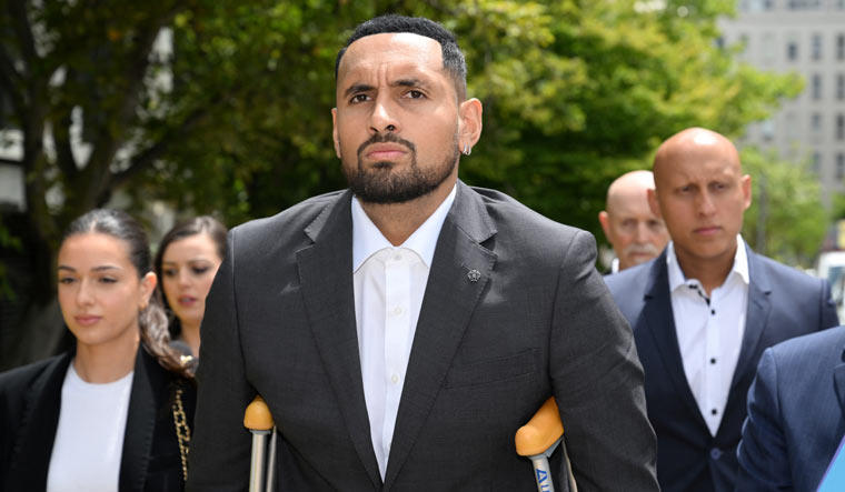 Nick Kyrgios arrives at the ACT Magistrates Court in Canberra, Australia | Reuters