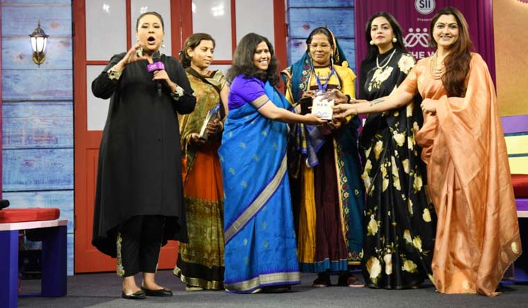 Monalisa Padhee and Asha Rao presented with awards by Divya Maderna and Kushboo Sundar, at the We the Women event anchored by Barkha Dutt | Sanjay Ahlawat