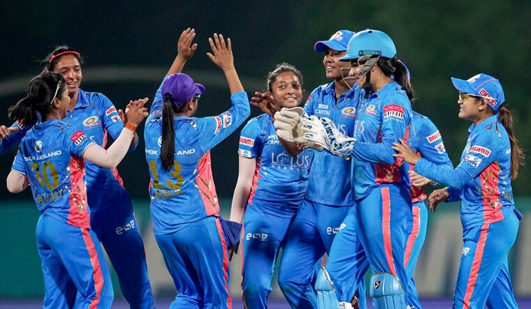 Mumbai: Mumbai Indian's Hayley Matthews along with her teammates celebrates the wicket of Delhi Capitals' Jess Jonassen during the 2023 Women's Premier League (WPL) Twenty20 cricket match between Mumbai Indians and Delhi Capitals at DY Patil Stadium in Navi Mumbai, Thursday, March 9, 2023. (PTI Photo/Kunal Patil)    (PTI03_09_2023_000303B)