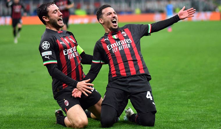 AC Milan's Ismael Bennacer celebrates scoring their first goal against Napoli, with Davide Calabria, in the Champions League quartrfinal first leg | Reuters