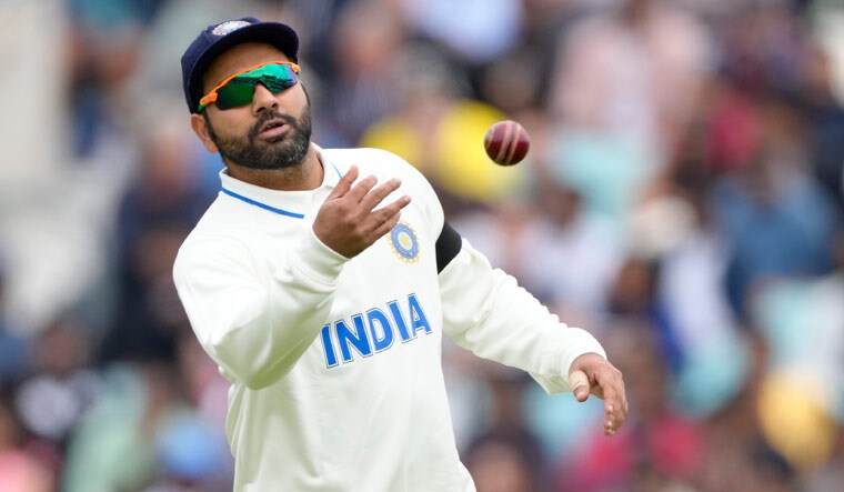 India skipper Rohit Sharma throws the ball back to pacer Mohammed Siraj on the first day of the ICC World Test Championship final against Australia at The Oval in London | AP