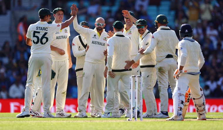 Cricket - ICC World Test Championship Final - Australia v India - The Oval, London, Britain - June 8, 2023Australia's Nathan Lyon celebrates the wicket of India's Ravindra Jadeja with teammates Action Images via Reuters/Paul Childs