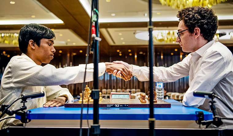 World Cup chess: Praggnanandhaa shocks Caruana, meets Carlsen in