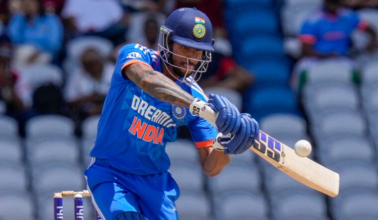 India's Tilak Varma plays a shot against West Indies during their first T20 cricket match at the Brian Lara Stadium in Tarouba, Trinidad and Tobago, Thursday, Aug. 3, 2023. (AP Photo/Ramon Espinosa)