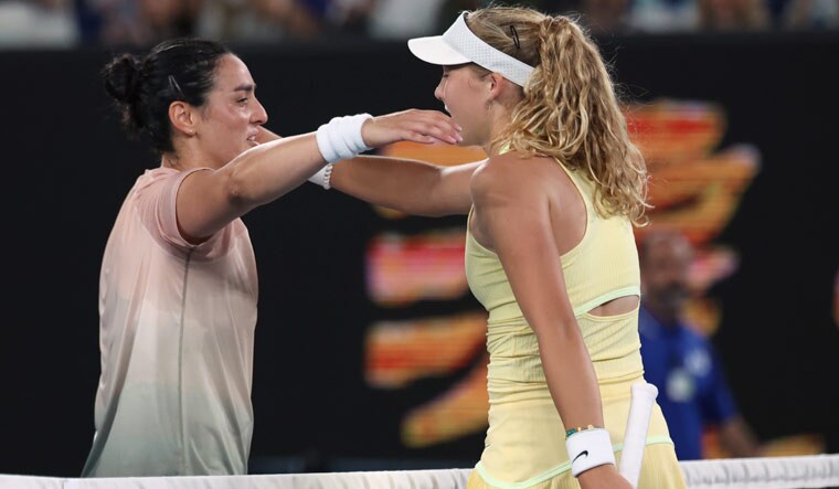 Mirra Andreeva (right) of Russia is congratulated by Ons Jabeur of Tunisia in following second round match at the Australian Open | AP