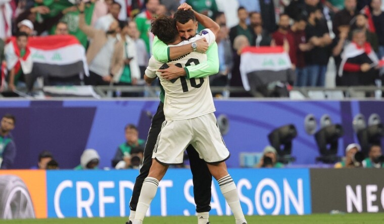 Iraqi players celebrate their team's win over Japan | AFP