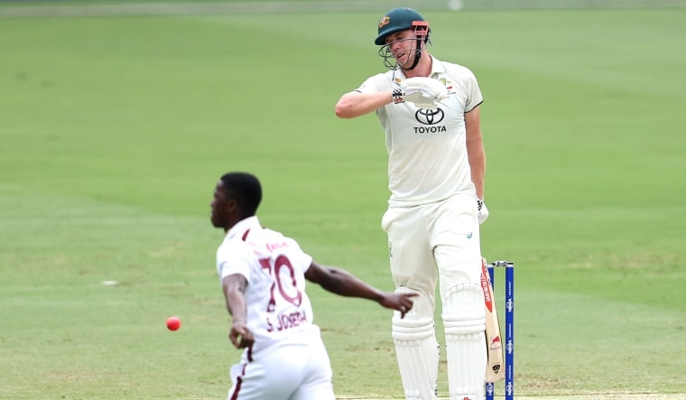 Cameron Green of Australia (R) is dismissed by Shamar Joseph of West Indies | AFP