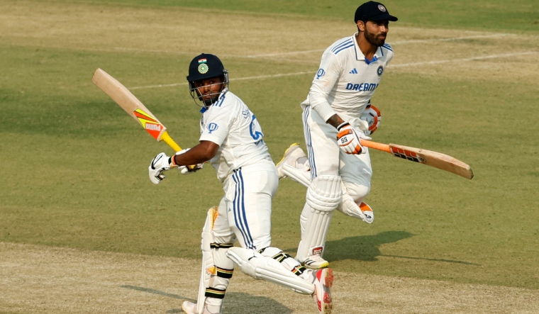 sarfaraz-khan-and-ravindra-jadeja-running-between-the-wickets-reuters