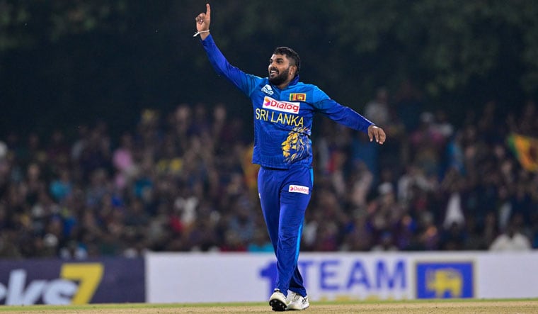Sri Lanka's Wanindu Hasaranga celebrates after dismissing Afghanistan's Najibullah Zadran (not pictured) during the second T20I, in Dambulla | AFP