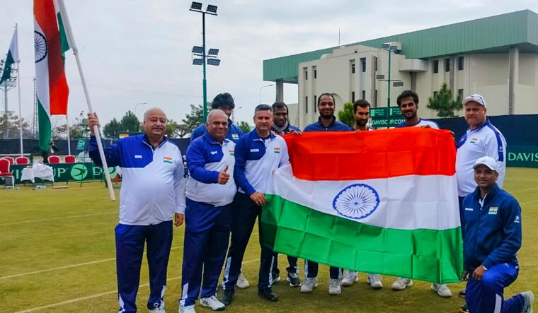 Islamabad: Indian team poses for photos after India's Yuki Bhambri and Saketh Myneni beat Pakistani duo Aqeel Khan and Muzammil Murtaza in doubles game during the Davis Cup 2024 tennis match, in Islamabad, Sunday, Feb. 4, 2024. Indian Davis Cup team advanced to World Group I after taking unassailable 3-0 lead against Pakistan. (PTI Photo/Amanpreet Singh)(PTI02_04_2024_000133B)