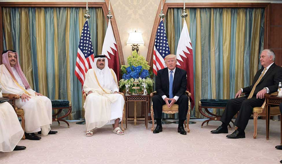 US President Donald Trump and Qatar's Emir Sheikh Tamim Bin Hamad Al-Thani