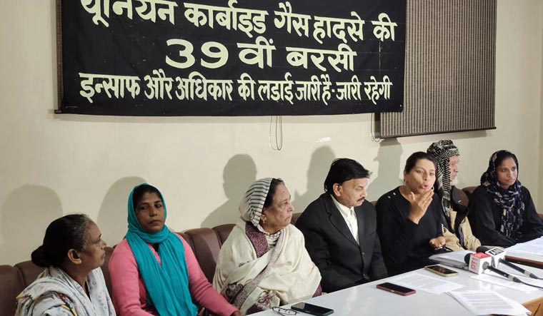 Bhopal gas tragedy survivors address media on the eve of the 37th anniversary of the disaster. Sanjan Singh on extreme right