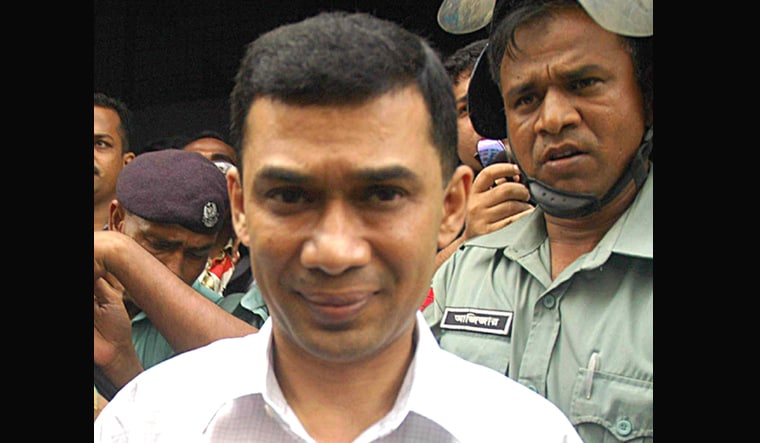 (File) Bangladeshi police escort Tarique Rahman, to Dhaka Court, in Dhaka | AP
