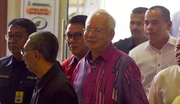 Malaysia's Najib Razak, ally charged in $1.6 billion graft case - The Week