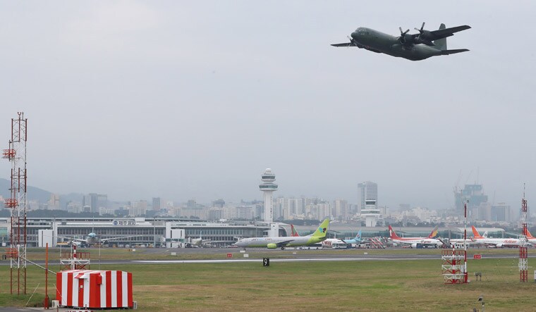 A South Korean Air Force's cargo plane transporting tangerines takes off the Jeju International Airport in Jeju Island | Reuters