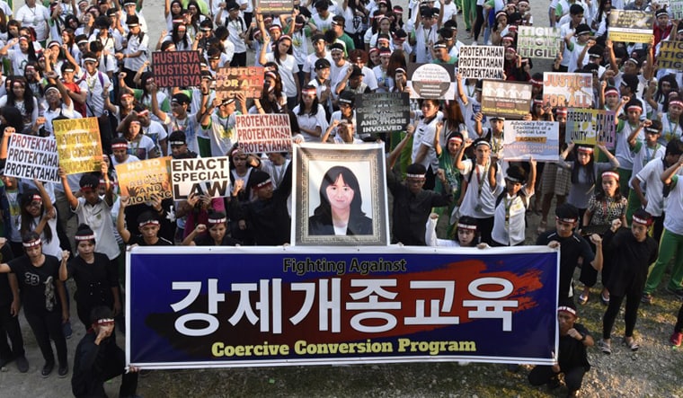 More than 1,20,000 people gathering in Seoul and the other major cities of South Korea on January 28 to protest against coercive conversion