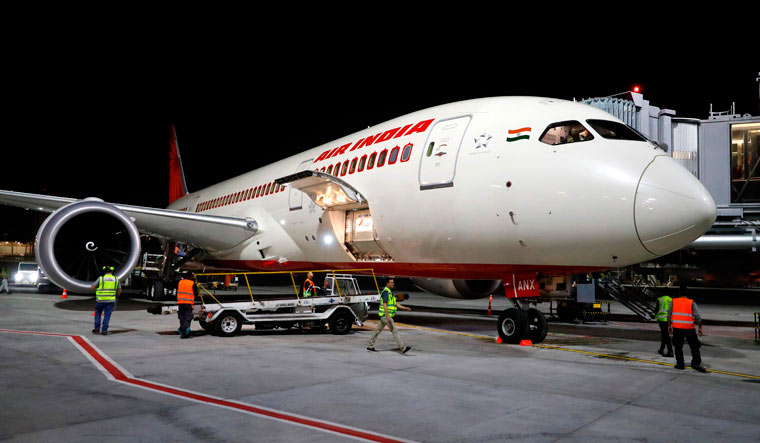 A Boeing 787 flight number AI139 of Indian national carrier Air India, from New Delhi, performs manoeuvres on the tarmac at Ben Gurion International Airport on the outskirts of Tel Aviv | AFP