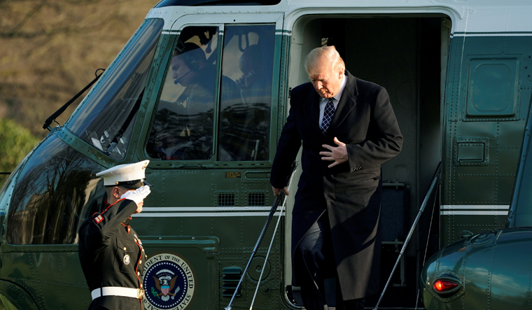 https://img.theweek.in/content/dam/week/news/world/images/2018/3/26/donald-trump-marine-one-reuters.jpg