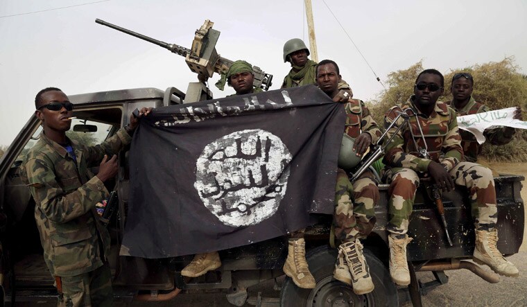 [File] Boko Haram fighters released over 100 girls who were kidnapped from Dapchi town last month | Reuters