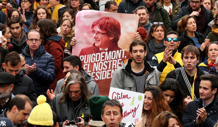 People protest after former president Carles Puigdemont was detained in Germany, during a demonstration held by pro-independence associations in Barcelona | Reuters