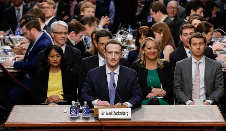 Facebook founder and CEO Mark Zuckerberg testifying during a Senate Commerce, Science and Transportation Committee and Senate Judiciary Committee joint hearing about Facebook on Capitol Hill in Washington, DC | AFP