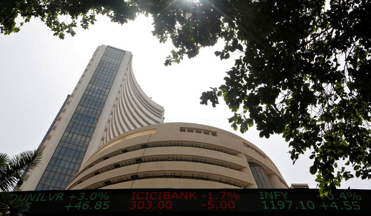 The Bombay Stock Exchange building is seen from a facade in Mumbai | Reuters