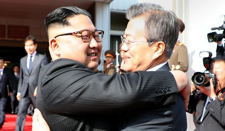 South Korean President Moon Jae-in bids fairwell to North Korean leader Kim Jong Un as he leaves after their summit at the truce village of Panmunjom, North Korea, in this handout picture provided by the Presidential Blue House on May 26, 2018 | Reuters