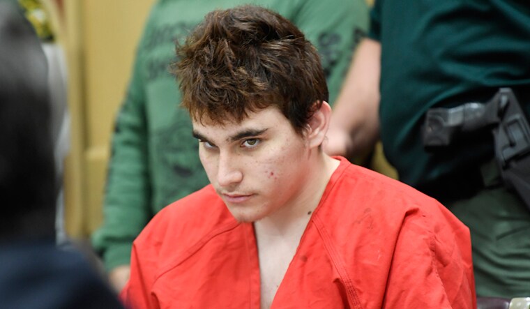 (File) Florida school shooting suspect Nikolas Cruz, looks up while in court for a hearing in Fort Lauderdale, Fla | AP