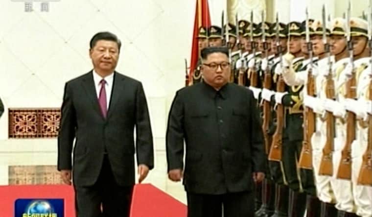In this image taken from a video footage run by China's CCTV, Chinese President Xi Jinping, walks with North Korean leader Kim Jong Un during a welcome ceremony at the Great Hall of the People in Beijing | CCTV via AP Video