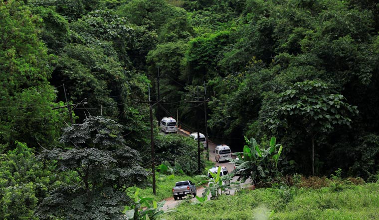 A group of ambulances go in to Tham Luang cave complex in the northern province of Chiang Rai, Thailand | Reuters