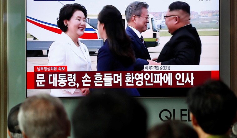 South Korean President Moon Jae-in and North Korean leader Kim Jong-un greet each other with their wives in Pyongyang | Reuters